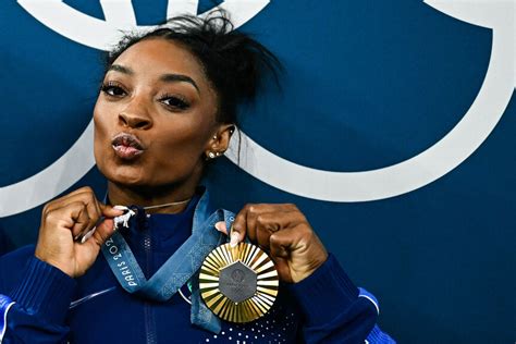 simone biles and goat necklace.